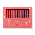 Heat Warning ColourPop Lippie Vault Set showcasing 10 Lippie Stix in gradient shades from bright coral and pink to berry and plum, arranged upright behind a clear window in a coral box labeled 'Hot In Here' with star and lightning graphics.
