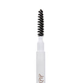 Champagne Blonde Pencil brow pencil by ColourPop, spoolie end standing upright in a macro close-up, black spiral bristles on a white tube against a clean white background for shaping and blending brows.