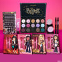 Bratz x ColourPop Full Collection set displaying a multi-pan eyeshadow palette with jewel-toned mattes and shimmers, face gems, two iridescent glitter gels, two liquid liners, and four character lip kits on a hot pink backdrop; ColourPop Full Collection Set.