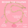 Brooklyn Charm x ColourPop Necklace showcases a gold link chain with enamel charms - pink lips reading ColourPop, So Juicy lip oil tube, bunny, strawberry, and pink beaded vial - laid flat on a pink background for a playful, beauty-inspired vibe.