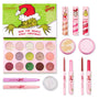 ColourPop x The Grinch full collection set displayed on white, featuring an open 15‑shade eyeshadow palette plus three lip glosses, two highlighters, two shadow sticks, glitter gel, and three lippie stix in pink holiday packaging by ColourPop.