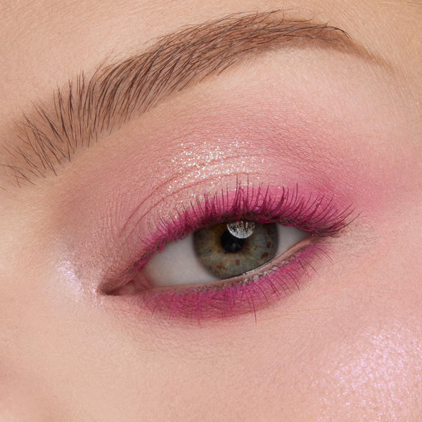 Hazel eye wears pink shimmer and magenta liner from the Cloud Spun Shadow Palette, a ColourPop Shadow Palette, highlighting sparkly cotton-candy hues in a macro beauty close-up.