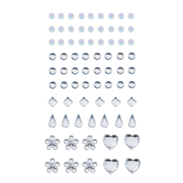 Individual Face and Hair Crystals arranged in neat rows - peel-and-stick crystal face jewels in clear and iridescent finishes, with round, square, teardrop, flower, and heart shapes - flat lay on white; ColourPop Crystal Face Jewels.