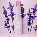 A-List Babe Youth-Boosting Serum Stick by Fourth Ray Beauty from the Best Face Scenario ColourPop Face Set stands open with dewy droplets, surrounded by lavender sprigs on a soft purple backdrop.