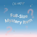 ColourPop Full-Size Mystery Product graphic showing silver 3D text reading “Full-Size Mystery Item” with pink question marks and sparkles on a blue-to-pink gradient background, promoting a Mystery Gift in the Shop All ColourPop collection.