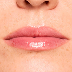 Glossy lips wearing Get Rich ColourPop Glossy Lip Balm Trio, showing a sheer berryβpink tint and high-shine, hydrated finish in a tight macro close-up of the mouth and surrounding skin.