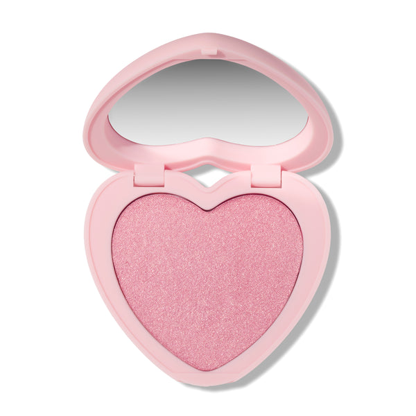 Heart to Get Not Your Baby Super Shock Blush showing a shimmery light pink heart-shaped pan in an open pastel pink heart compact with mirror, displayed on a clean white background for US makeup shoppers