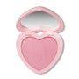 Heart to Get Not Your Baby Super Shock Blush showing a shimmery light pink heart-shaped pan in an open pastel pink heart compact with mirror, displayed on a clean white background for US makeup shoppers