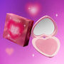 ColourPop Not Your Baby Super Shock Blush from the Heart to Get collection displayed in an open pink heart-shaped compact beside its matching rosy box on a dreamy pink-to-purple gradient background with soft glowing stars.