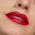 Bold red lips wearing Va Va Voom from the ColourPop Lippie Stix + Pencil Set, the creamy matte Lippie Stix fills the lips while the pencil defines crisp edges; close-up studio beauty swatch highlighting smooth texture and vibrant blue-red color.
