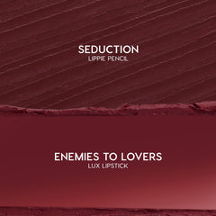Swatch duo showcases Slow Burn: ColourPop Lux Lipstick shade Enemies to Lovers, a smooth deep burgundy smear on the bottom, paired with Seduction Lippie Pencil’s textured wine‑red stroke above, on a clean studio background.