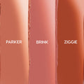 Swatch trio displays XOXO Bestie ColourPop Lippie Stix set with vertical stripes: Parker (peachy nude), Brink (rosy mauve), and Ziggie (warm terracotta) shown side by side on a clean studio backdrop.