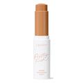 ColourPop Pretty Fresh Tinted Foundation Balm in Dark 17, open twist-up stick showing a warm deep tan shade, standing upright in a white tube with peach “Pretty Fresh” lettering on a clean white background.