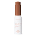 ColourPop Pretty Fresh Tinted Foundation Balm in Deep Dark 21 standing uncapped, twist-up stick revealing a rich deep-brown shade, housed in a sleek white tube with blush script branding against a clean white background.