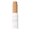 ColourPop Pretty Fresh Tinted Foundation Balm in Medium Dark 13 twists up from a white tube with blush pink “Pretty Fresh” script, cap removed, revealing a medium-dark tan balm stick against a plain white background.