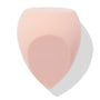 Blush-pink Sculpting Sponge blending foundation and contour with a flat top, rounded sides, and a pointed precision tip, shown angled on a white backdrop with soft shadow; ColourPop Makeup Tools & Accessories for seamless application.