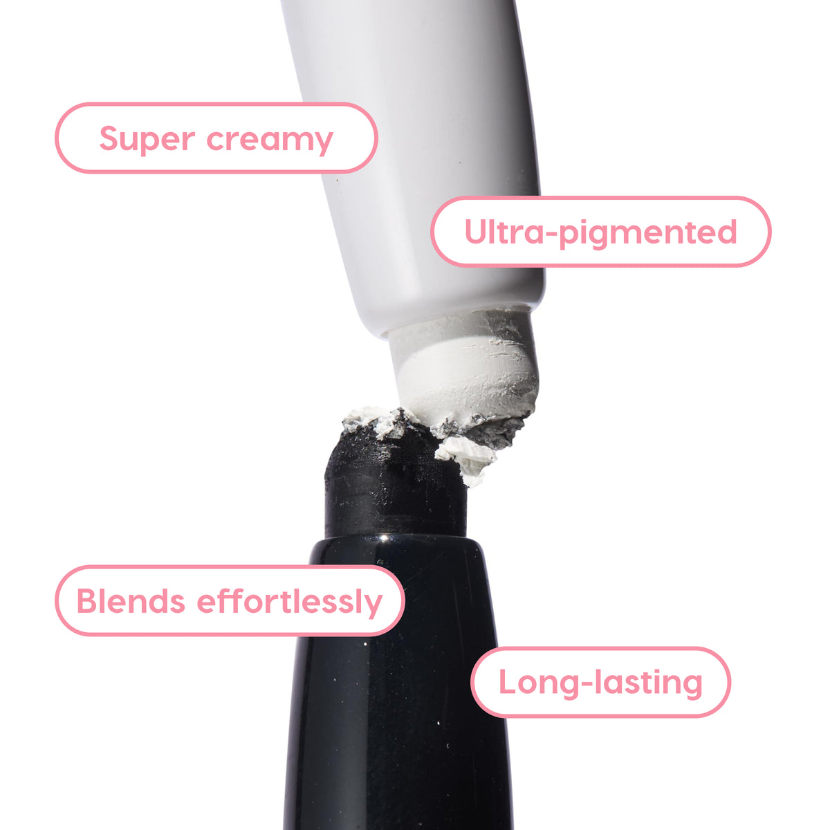 ColourPop Shadow Stix Totally Wicked eyeshadow crayon presses its creamy white tip into the base, showcasing an ultra-pigmented, blendable, long-lasting formula in a close-up on a white background with pink feature callouts.