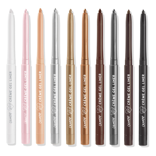Tried and True ColourPop Crème Gel Liner set lines up ten twist-up eyeliners with caps off on a white background, showing shades spanning white, pink, nude, silver, gold, bronze, brown, gray, burgundy, and black.