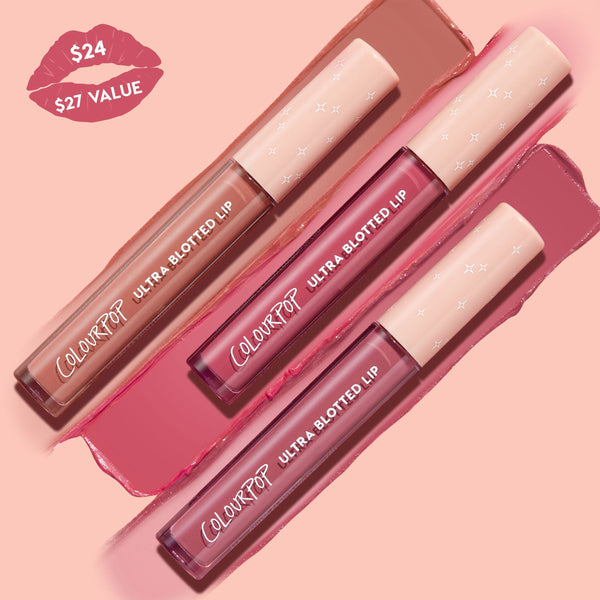 ColourPop Ultra Blotted Lip Pink Plz trio shows three tubes laid diagonally with nude, rose, and berry swatches on a blush-pink background; pale caps with star accents and a lip-shaped $24/$27 value badge highlight the soft-matte Ultra Blotted Lip set.