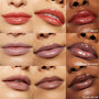 Glossy lips showcase three lip oil shades - Bells (warm red), Team Edward (cool mauve), and Team Jacob (deep cocoa) - applied across diverse skin tones in a 3x3 grid, highlighting shine from the Twilight x ColourPop Full Collection, a ColourPop Full Collection Set.