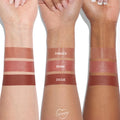 Three arms display XOXO Bestie ColourPop Lippie Stix swatches - Parker (warm nude), Brink (rosy pink), and Ziggie (rich terracotta) - striped across light, medium, and deep skin tones on a white background, showing shade range and color payoff.
