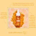 Turmeric Serum dropper bottle glows with amber formula as it rests on a pile of turmeric powder, white pipette upright, styled on a peach backdrop with dewy bubbles - a brightening ColourPop Face Serum for radiant, healthy-looking skin.