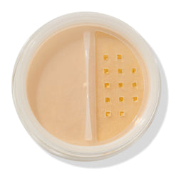 Top-down view of an open round jar of ColourPop No Filter Loose Setting Powder in Banana, showing a half divider and square-hole sifter dispensing pale yellow powder against a clean white background.