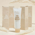 Fourth Ray Beauty The Lightweight hydrator tube standing upright, a ColourPop Face Moisturizer, gold lettering, 1.7 fl oz, surrounded by matching beige cartons and soft pampas accents on a warm cream backdrop.