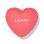 Heart-shaped coral pink compact with white ColourPop logo, closed and centered, showcasing 4ever Yours ColourPop Pressed Powder Blush packaging against a clean white background with a soft shadow.