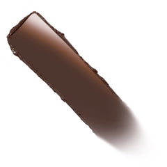 Deep chocolate-brown ColourPop Lippie Stix swatch - Oh, Behave - glides in a smooth, creamy swipe with a subtle sheen, shown diagonally on a clean white background.