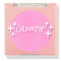 ColourPop Pressed Powder Blush in Flamingo shows a vibrant hot pink pan inside a square peach compact with a clear lid and white sparkles logo, closed and travel-friendly on a light background.