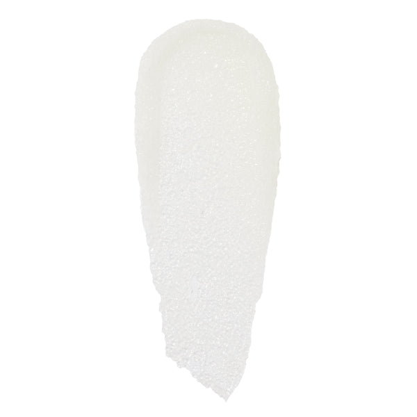 Translucent white, sugar-granule swatch of Just One Bite ColourPop Lip Scrub, smeared in a single elongated swipe with fine crystals catching light on a clean white background.