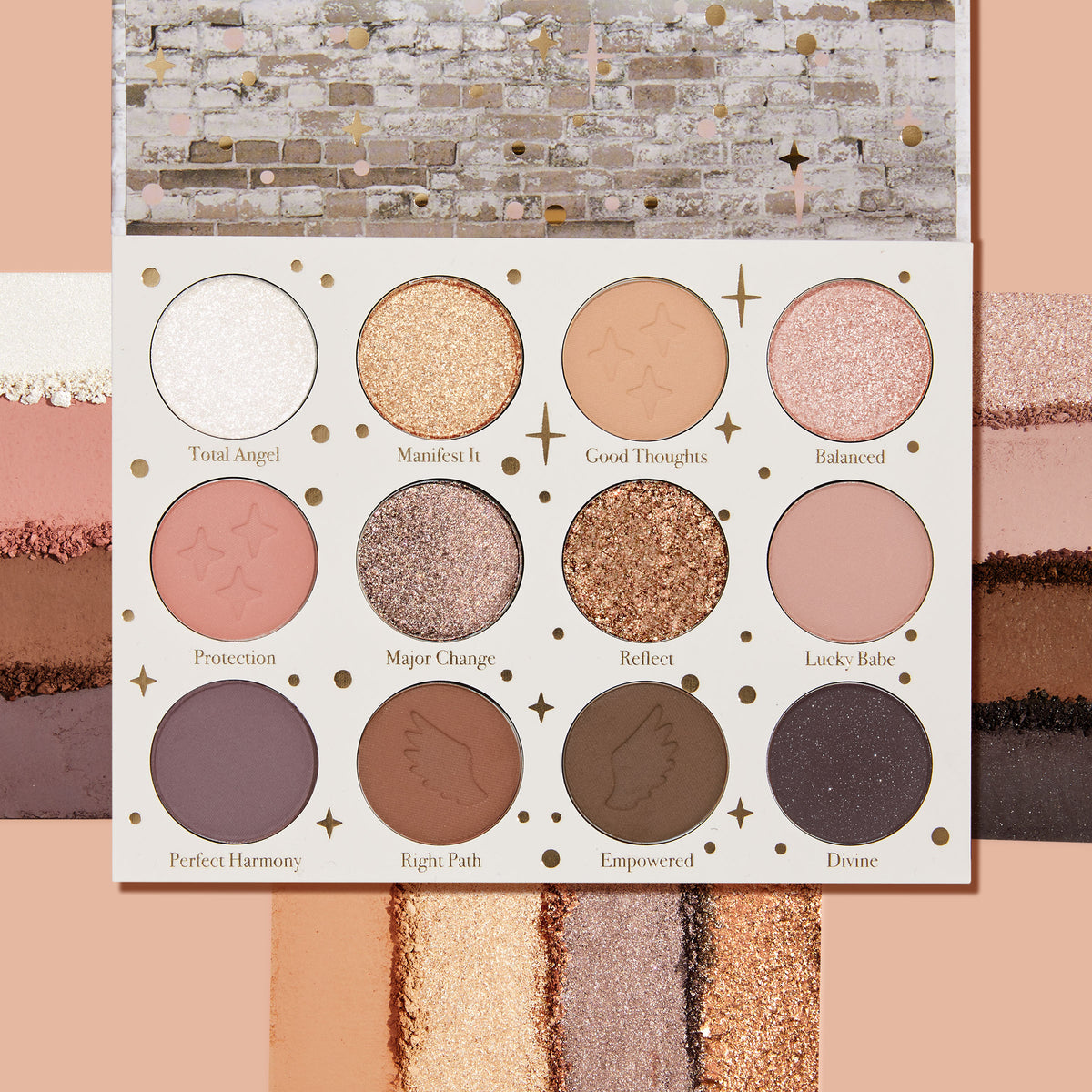 11:11 ColourPop Shadow Palette opens to 12 pans in a white case with gold stars, showing warm neutrals and pinks in matte and glittery metallic finishes, with crushed swatches above and below on a peach backdrop; shades include Reflect and Divine.