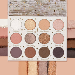 11:11 ColourPop Shadow Palette opens to 12 pans in a white case with gold stars, showing warm neutrals and pinks in matte and glittery metallic finishes, with crushed swatches above and below on a peach backdrop; shades include Reflect and Divine.