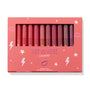 Heat Warning ColourPop Lippie Vault Set showcasing 10 Lippie Stix in gradient shades from bright coral and pink to berry and plum, arranged upright behind a clear window in a coral box labeled 'Hot In Here' with star and lightning graphics.