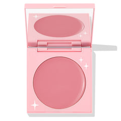 Angel Energy ColourPop Cream Blush compact opened to reveal a rosy-pink pan and mirror, housed in a pastel pink square case with white star accents on a clean white background.