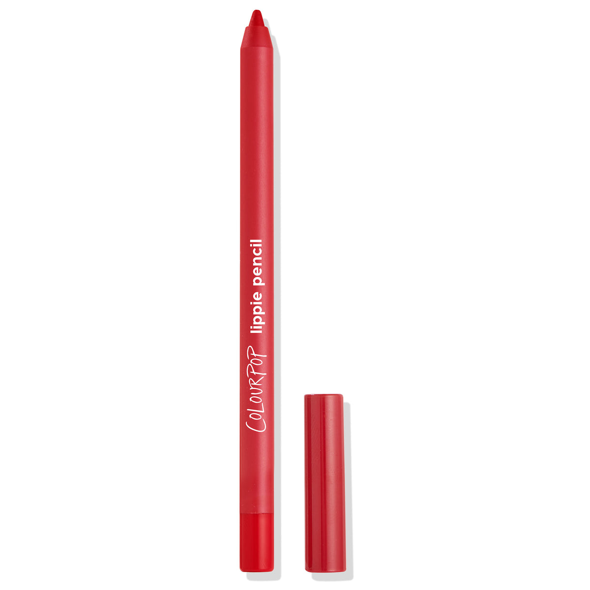 Bossy ColourPop Lippie Pencil stands upright with its red tip exposed and the cap beside it, featuring a matte red barrel and white “lippie pencil” branding on a clean white background for precise lip lining and bold red looks.