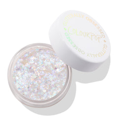 Disco Lady ColourPop Glitter Gel jar sits open, revealing opalescent, chunky glitter suspended in a clear base, while the white cap printed “Glitterally Obsessed” rests ajar on a clean white studio background.
