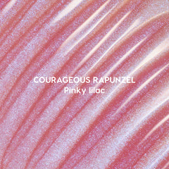 Courageous Rapunzel Ultra Glossy Lip swatch showing shimmery pinky lilac Disney Princess lip gloss with high-shine, iridescent glitter streaks spread in smooth, reflective waves on a close-up background.