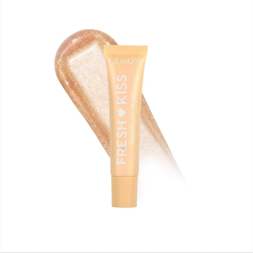 Colourpop Fresh Kiss Glossy Balm in Buttery Pancakes shade standing upright against a white background, showcasing the soft yellow tube lip gloss & lip oil hybrid with bold white branding for a moisturizing, glossy finish.