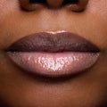 Close-up swatches of Colourpop Peach Mochi Fresh Kiss Glossy Balm on models’ lips, showing sheer peachy shimmer and high-shine finish, highlighting how this Lip Gloss & Lip Oil hybrid looks on different skin tones.