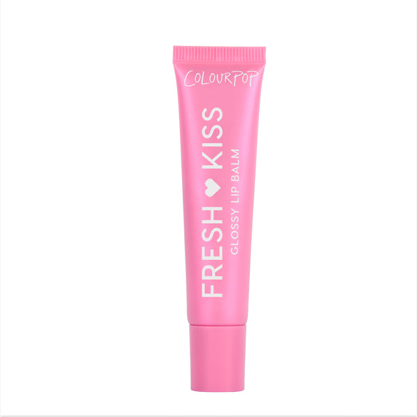 Colourpop Raspberry Crème Fresh Kiss Glossy Balm standing upright against a white background, showing its bright pink squeeze tube packaging and bold white logo, promoting hydrating Lip Gloss & Lip Oil shine for soft, glossy lips.