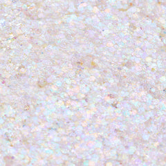 Disco Lady Glitter Gel shimmering in a close-up swatch, iridescent opal hex and micro glitter suspended in clear gel reflecting pastel rainbow hues; macro texture for ColourPop Glitter Gel product photography.