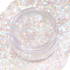 Clear jar of Disco Lady Glitter Gel shimmering with iridescent, chunky opal flakes, open to show texture, sitting on a wide swatch of matching sparkle on white; ColourPop Glitter Gel for face and body festival makeup.