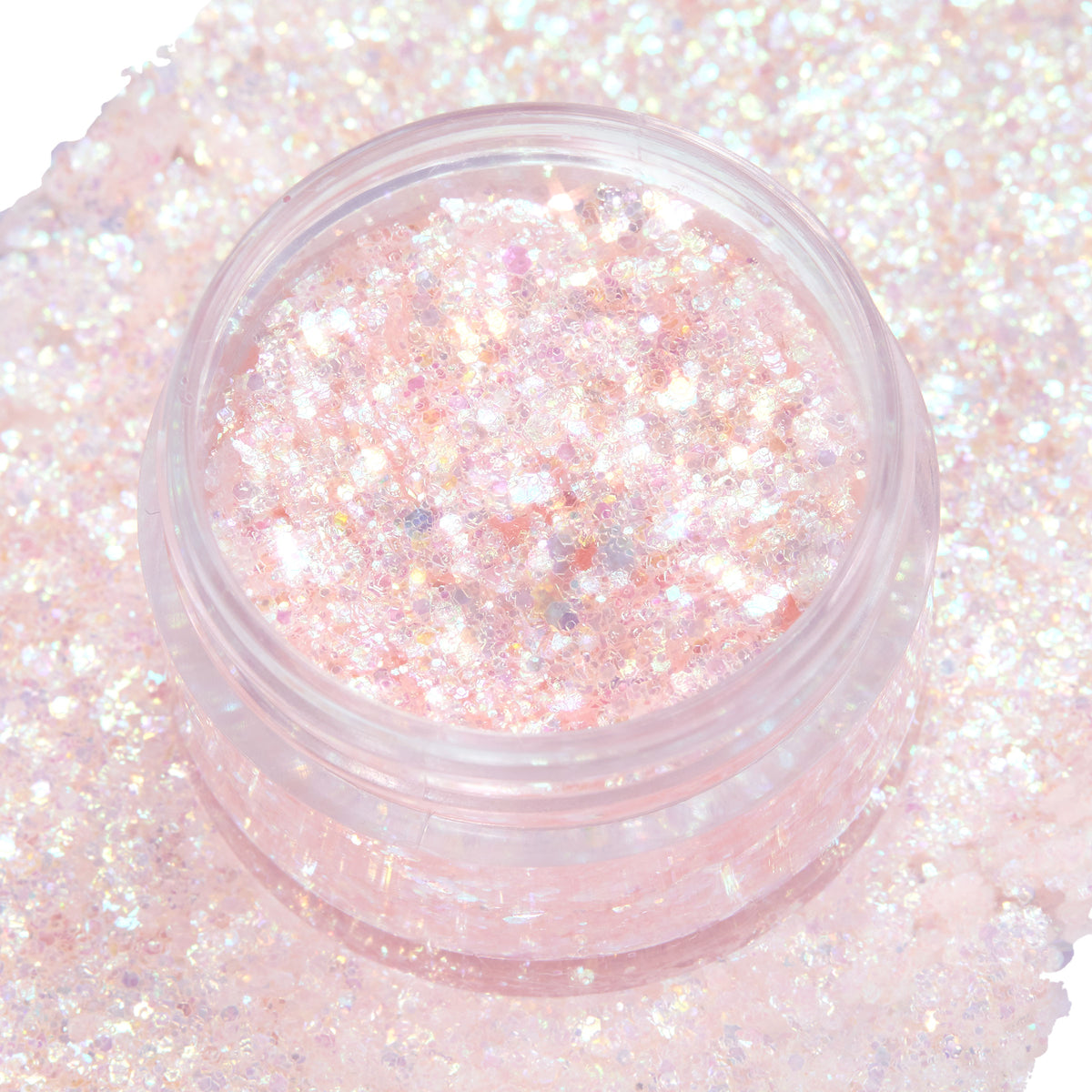 Open jar of So Cute ColourPop Glitter Gel shimmering with chunky iridescent pink and opal flecks, resting on a dense swatch of the same sparkle on white, highlighting the translucent gel base and high-shine finish.