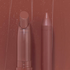 Big Smooch ColourPop Lippie Stix + Pencil Set showcasing a creamy rosy-mauve Lippie Stix and matching lip pencil standing side by side against a swatched, dewy nude backdrop, close-up product shot.