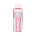 ColourPop 2 Die 4 Ultra Glossy Lip standing upright against a white background, showing its shimmery light pink Heart to Get shade in a clear pink tube topped with a translucent heart-shaped cap for cute, high-shine lip gloss looks.