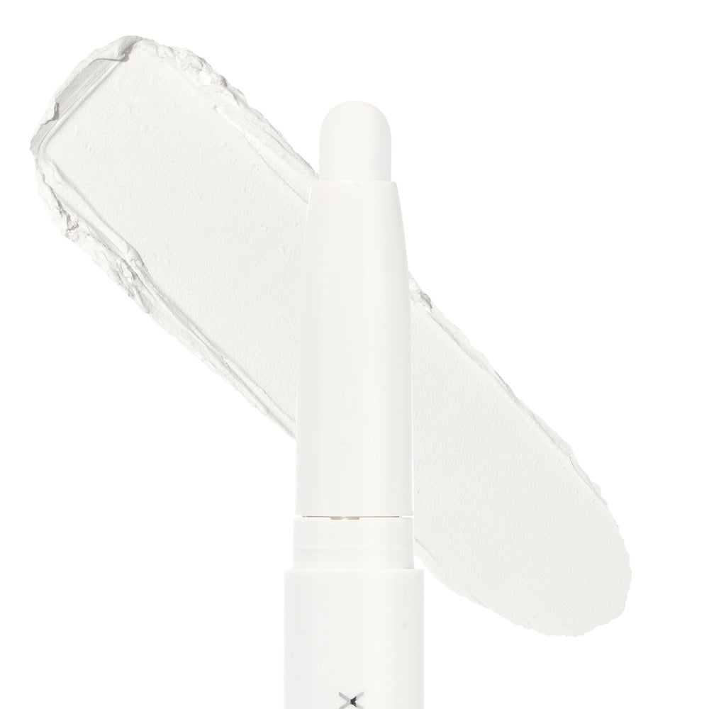 Hey Boo Shadow Stix glides a creamy matte white eyeshadow swatch on a white backdrop, showing the twist-up crayon tip and smooth texture; ColourPop Shadow Stix ideal for brightening lids, highlighting, or priming.