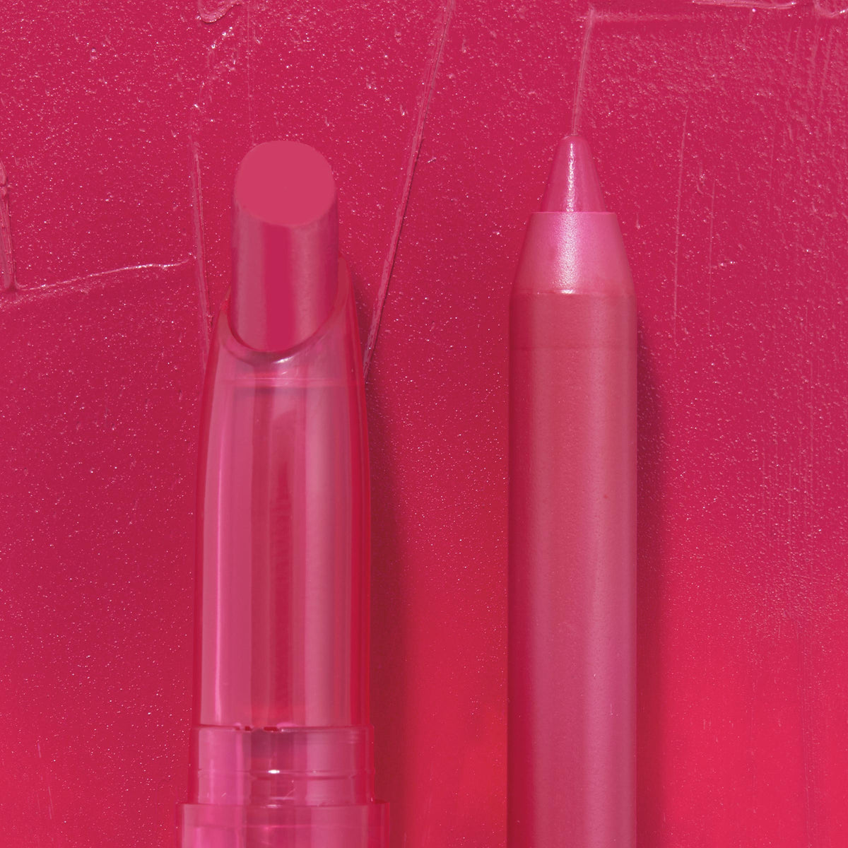 Ultimate Lip Combo, a ColourPop Lippie Stix + Pencil Set, showcases a hot-pink lipstick in a clear tube beside a matching lip pencil, displayed on a textured fuchsia swatch to highlight creamy, full-coverage color.