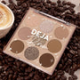 Deja Brew ColourPop Shadow Palette displaying nine coffee-inspired shades - matte and shimmer browns, taupes, and champagne - opened in a 3x3 layout on roasted coffee beans next to a latte, highlighting neutral eye looks.